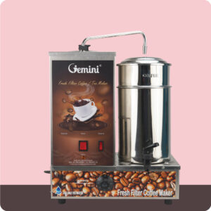 A Gemini Fresh Filter Coffee Maker with a stainless steel coffee urn, two red switches, and coffee bean graphics on the front, displayed against a pink and brown background.